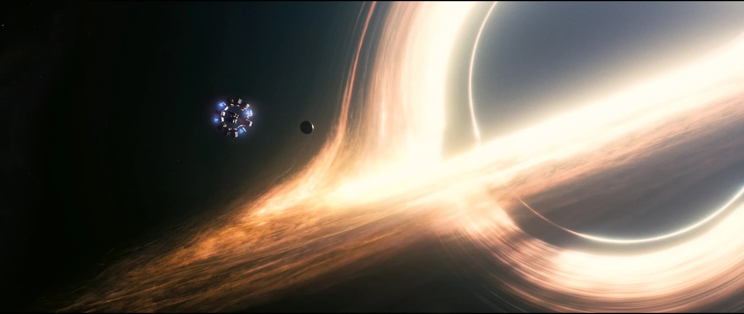 The black hole from Interstellar, a bright ring against deep space.
